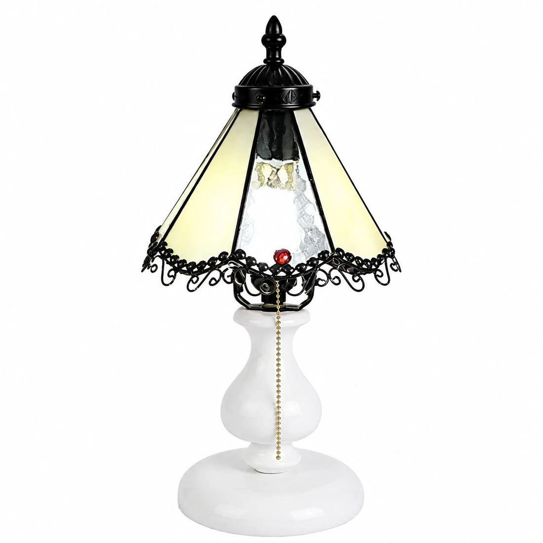 Pale yellow vintage stained glass table lamp on a white background