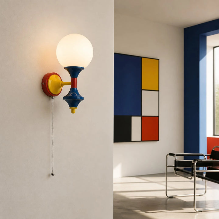 Style A color-block wall sconce with pull chain in a modern interior