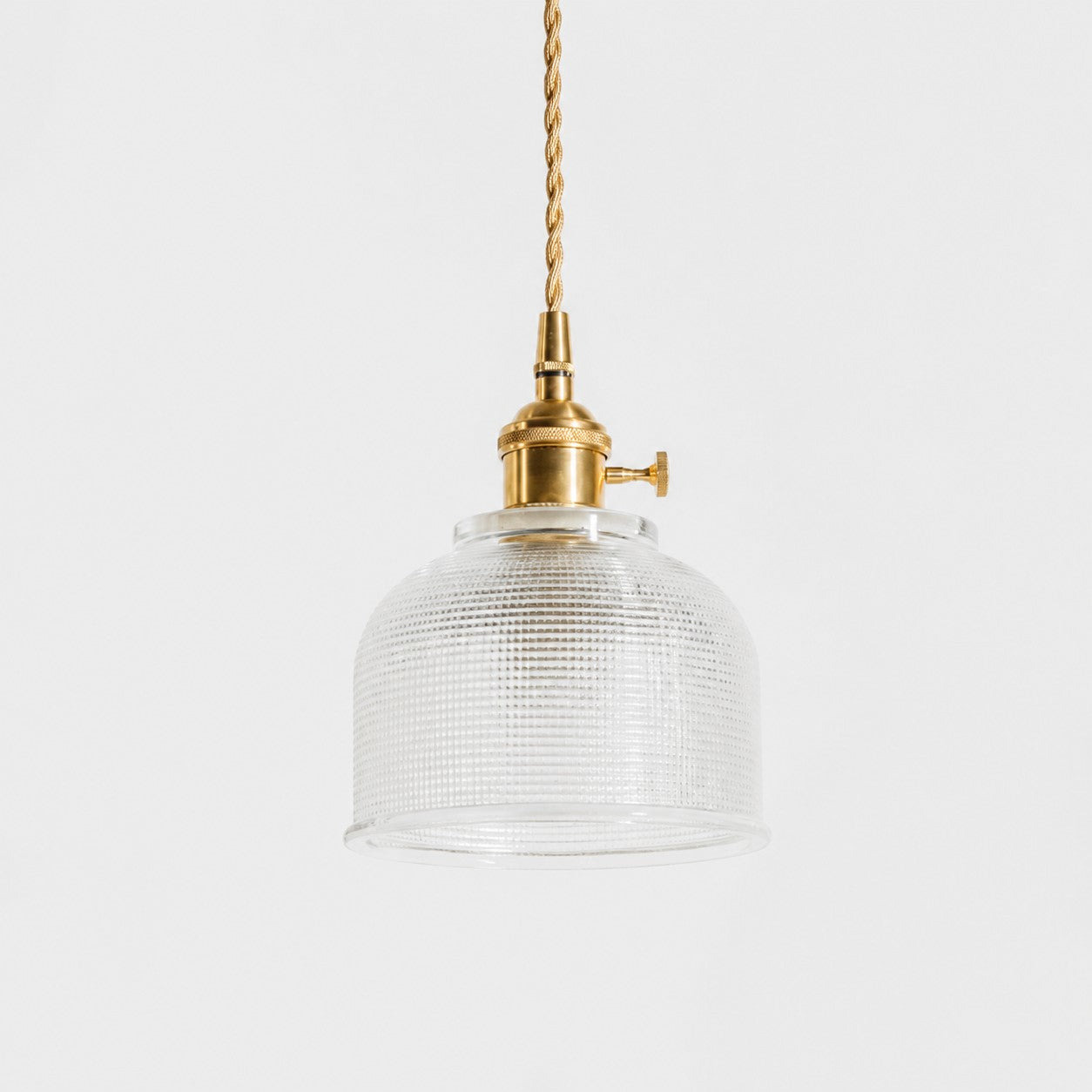 Style C textured glass shade with antique brass E27 socket, front view