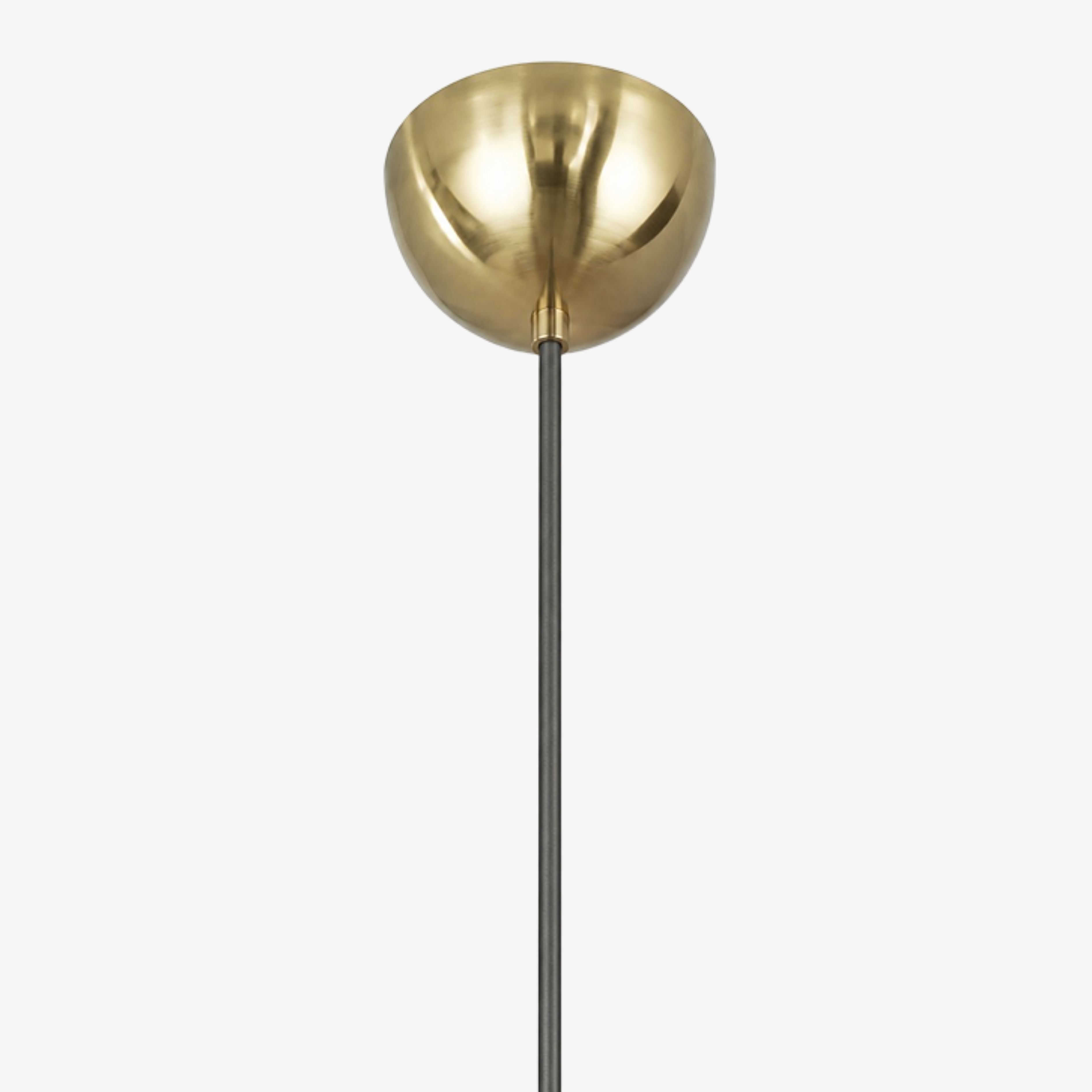 Antique brass ceiling canopy and black suspension cord detail