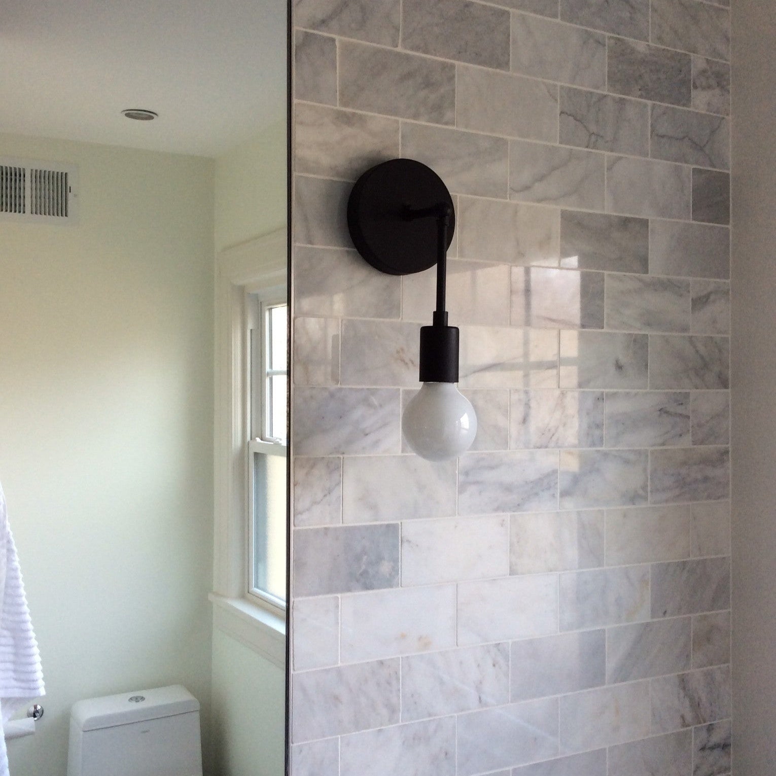 Black Swivel Functional Wall Sconce - Stylish Bedroom & Bathroom Accent