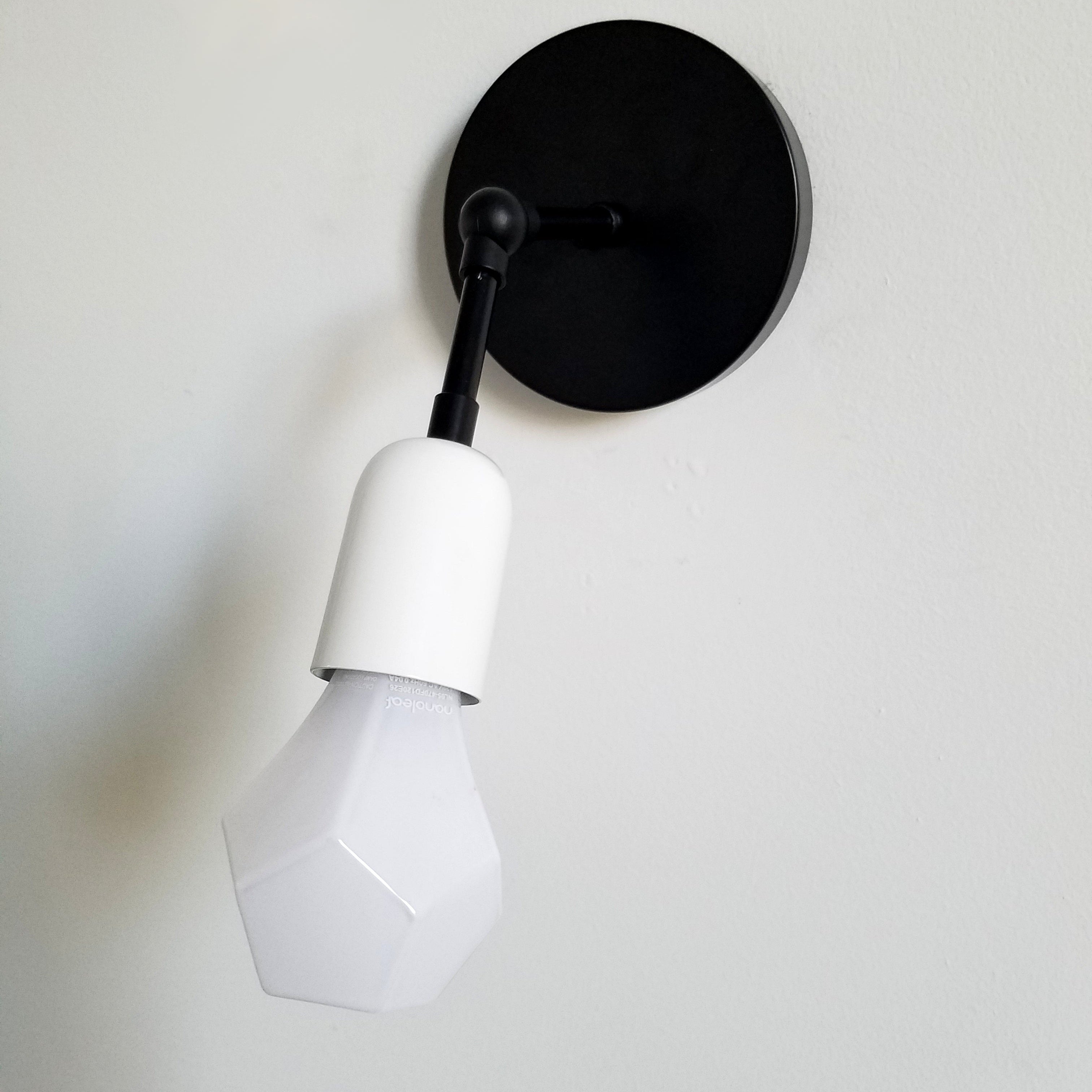 Black Swivel Functional Wall Sconce - Stylish Bedroom & Bathroom Accent