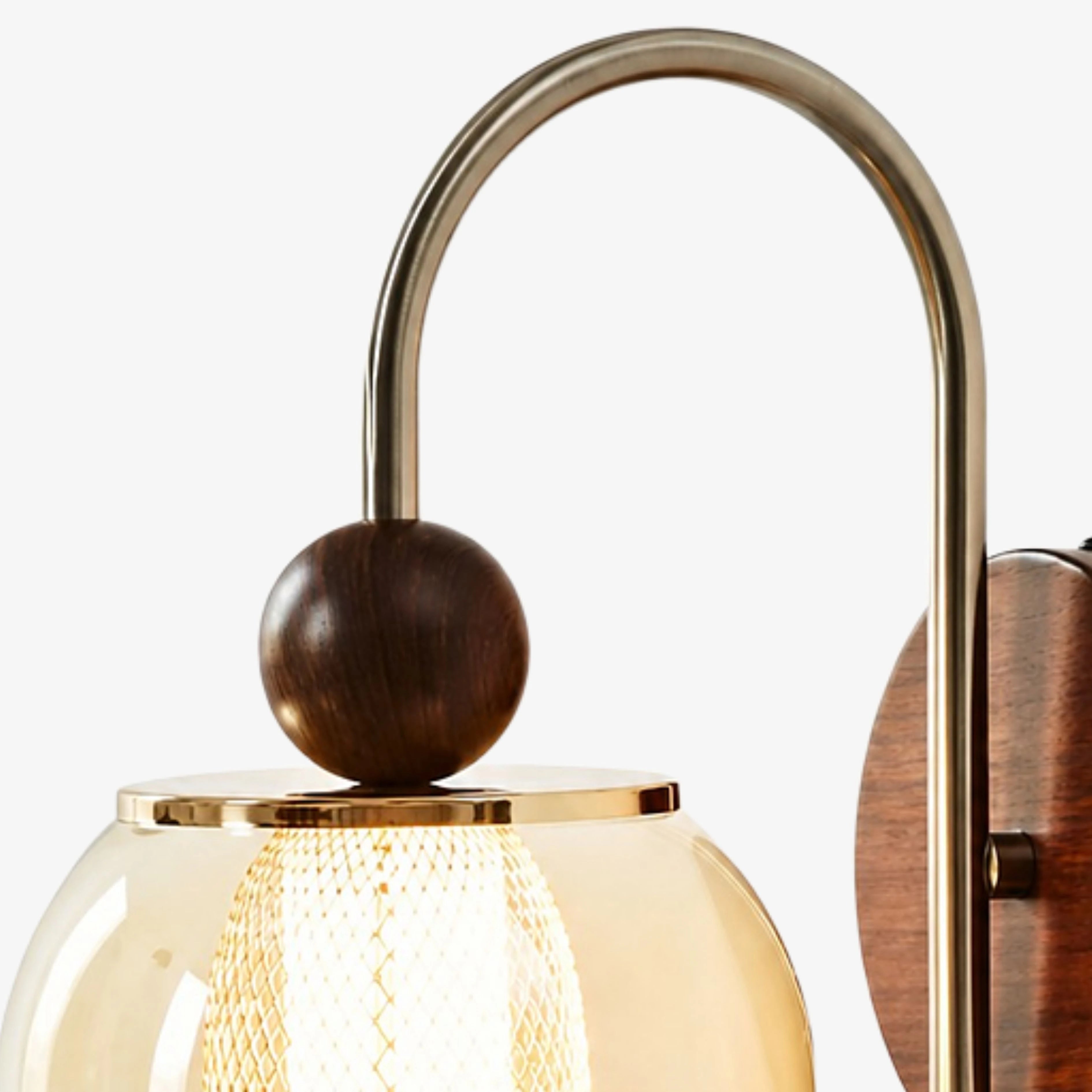 Arched metal arm and wood accent sphere detail