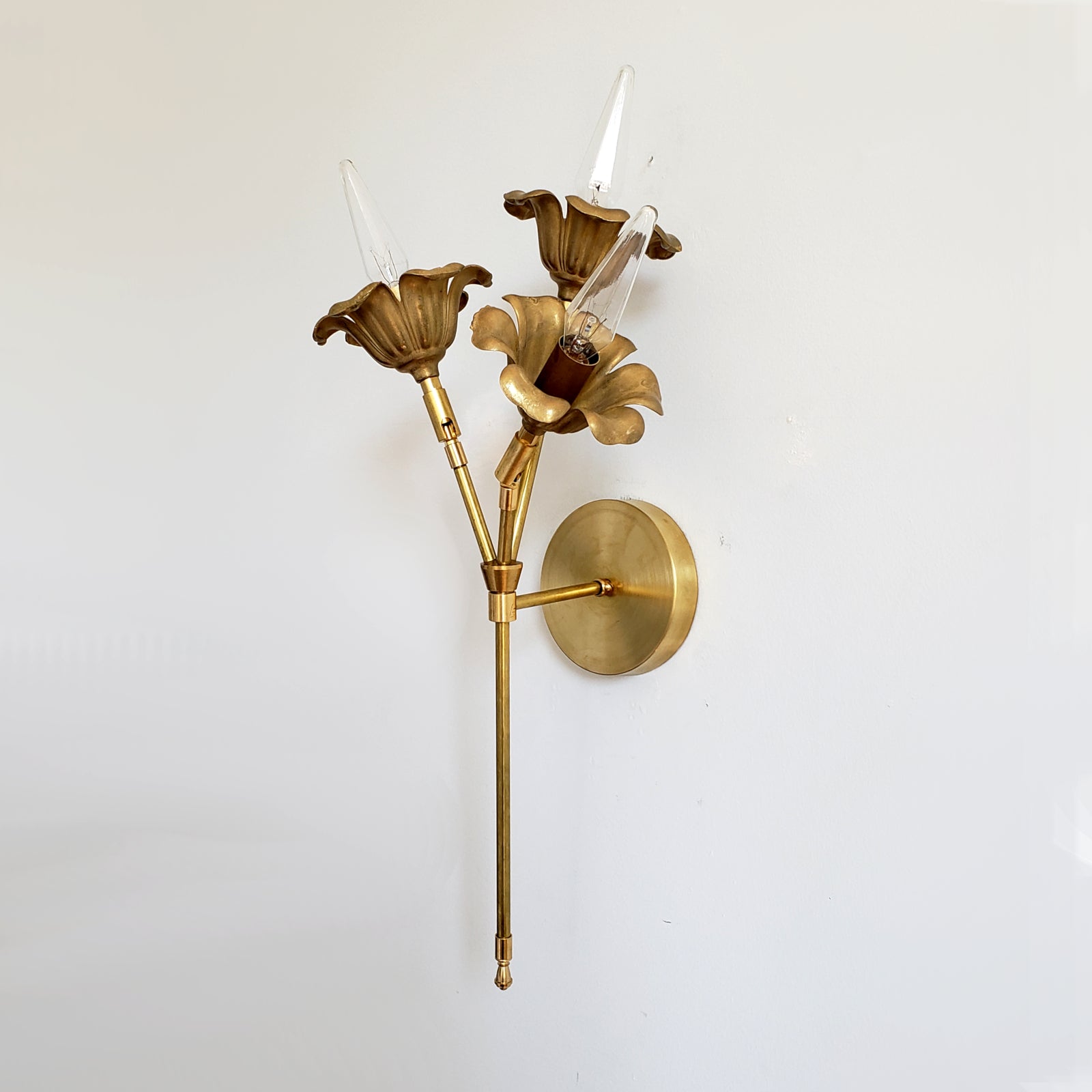 Three-Light Brass Wall Sconce - Floral Design for Elegant Interiors