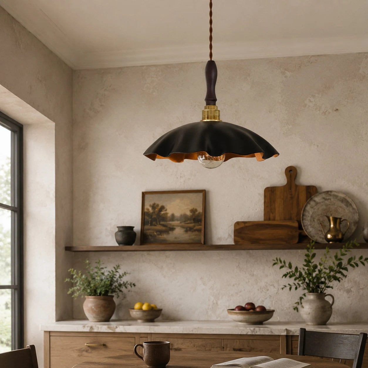 cowhide pendant light installed above a quiet tea room shelf