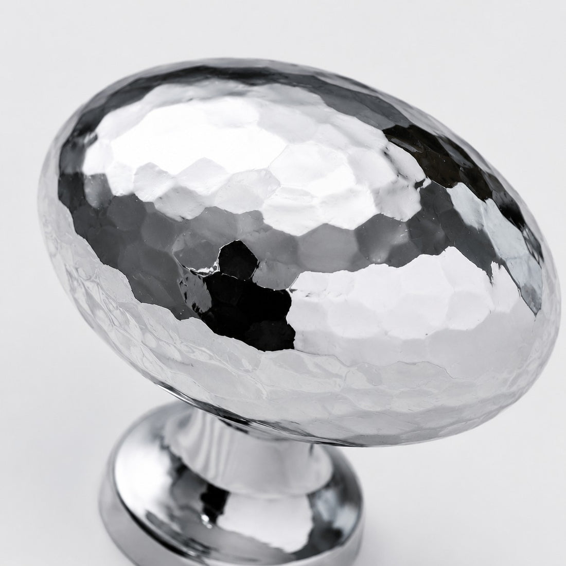 Close view of cabinet knob finish and mounting stem
