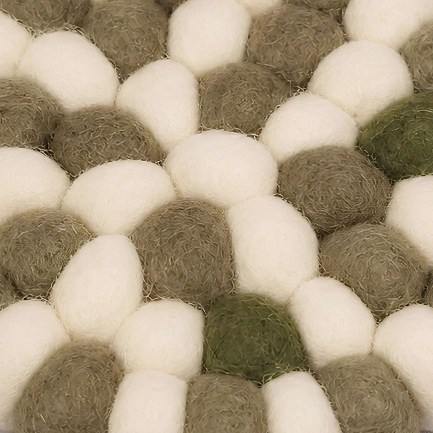 Close view of soft felt ball texture