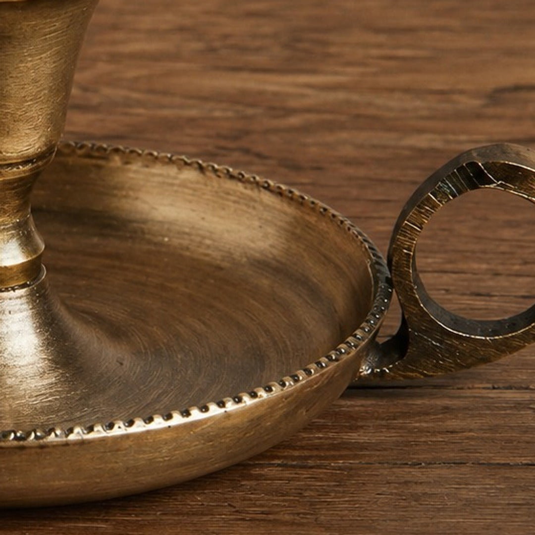 Aura candlestick cup, tray rim, and handle close-up