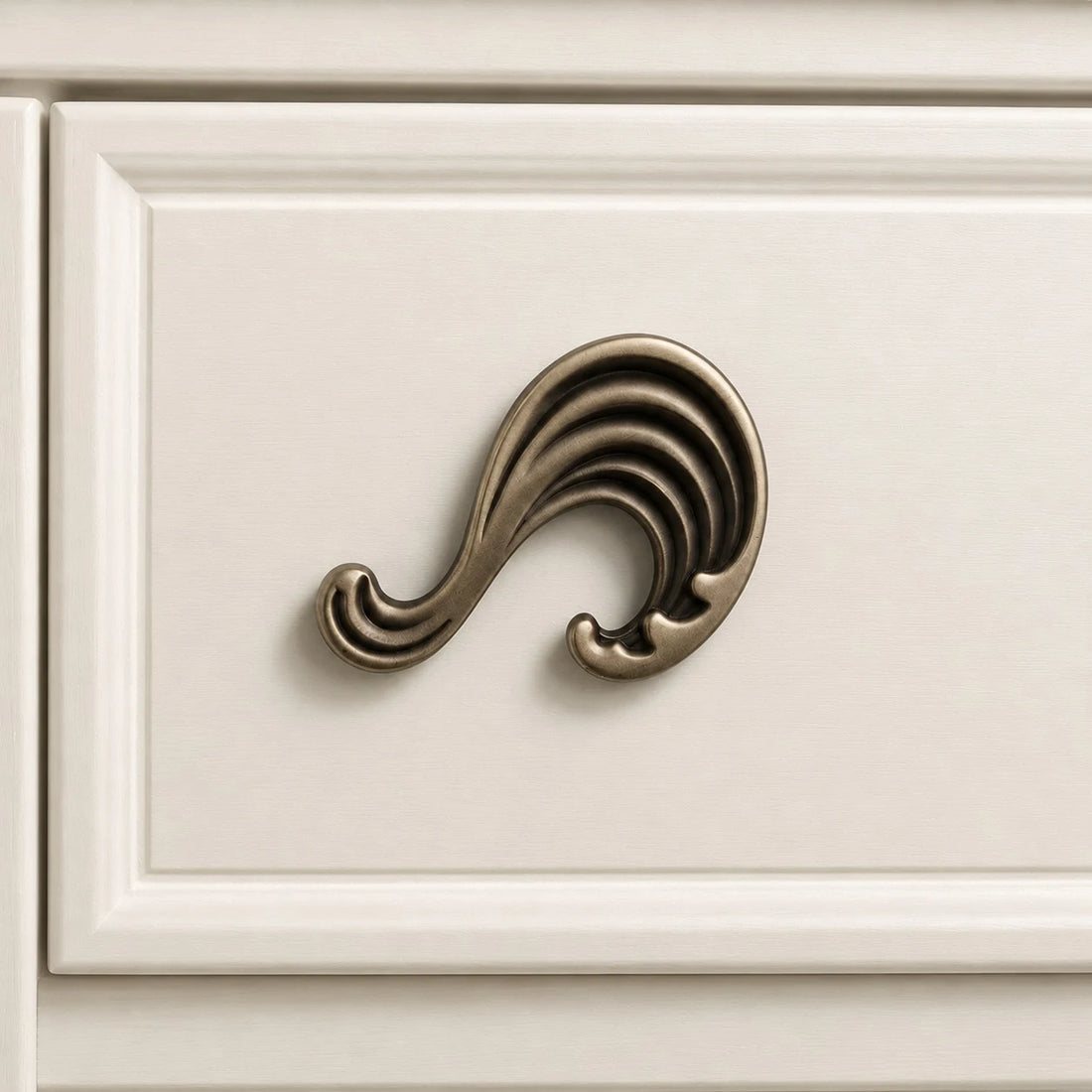 Wave cabinet knob in Antique Brass