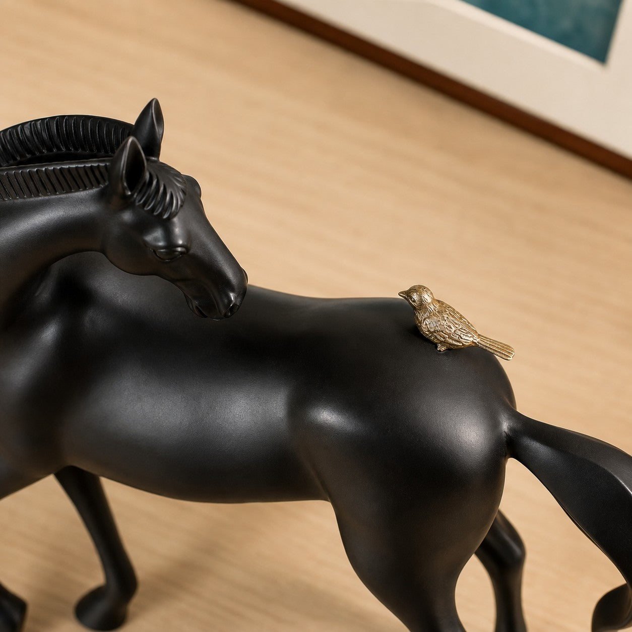 Equora black horse and copper bird sculpture detail