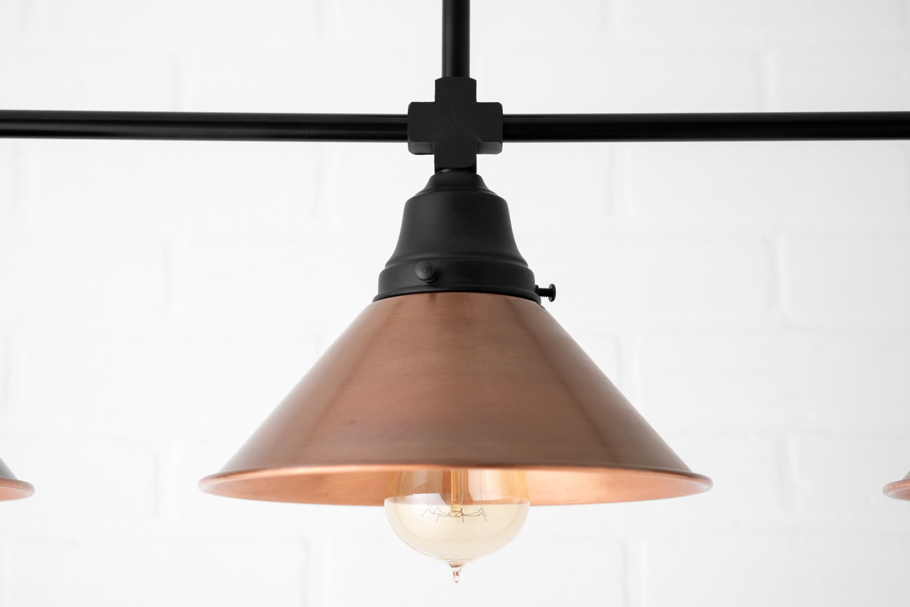 Conique Metal Aged Copper Three-Light Pendant – Sleek Industrial Fixture for Dining Rooms