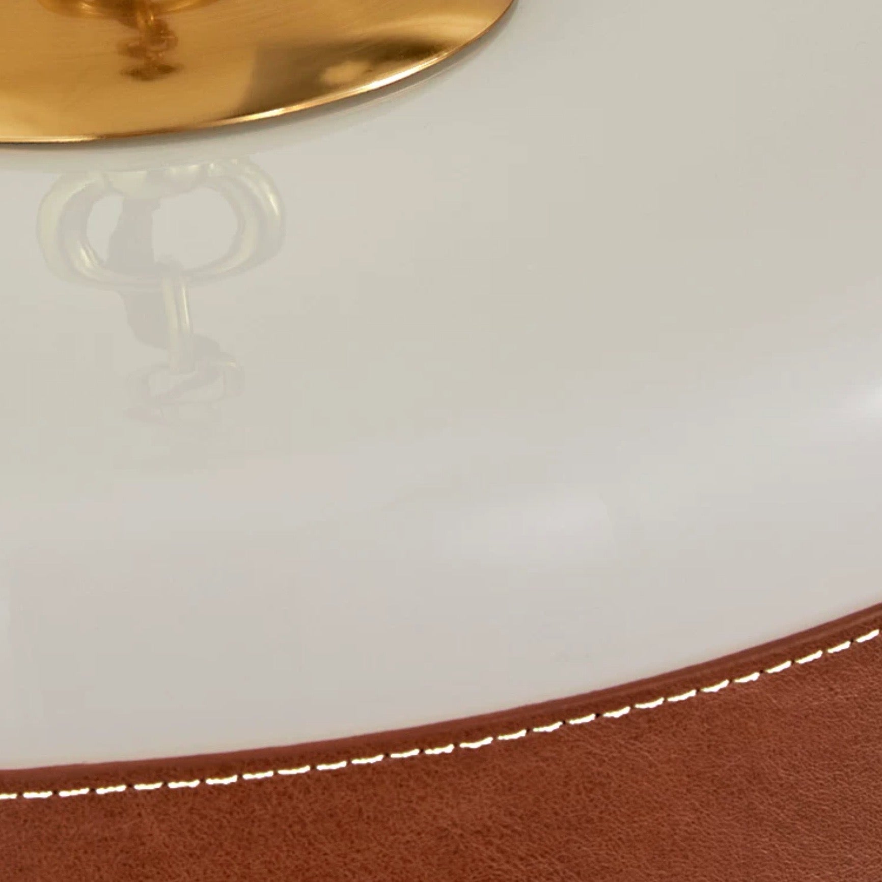 Milky glass texture and brass underside detail