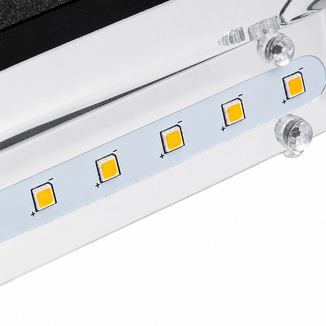 Close view of the LED module inside the black wall light