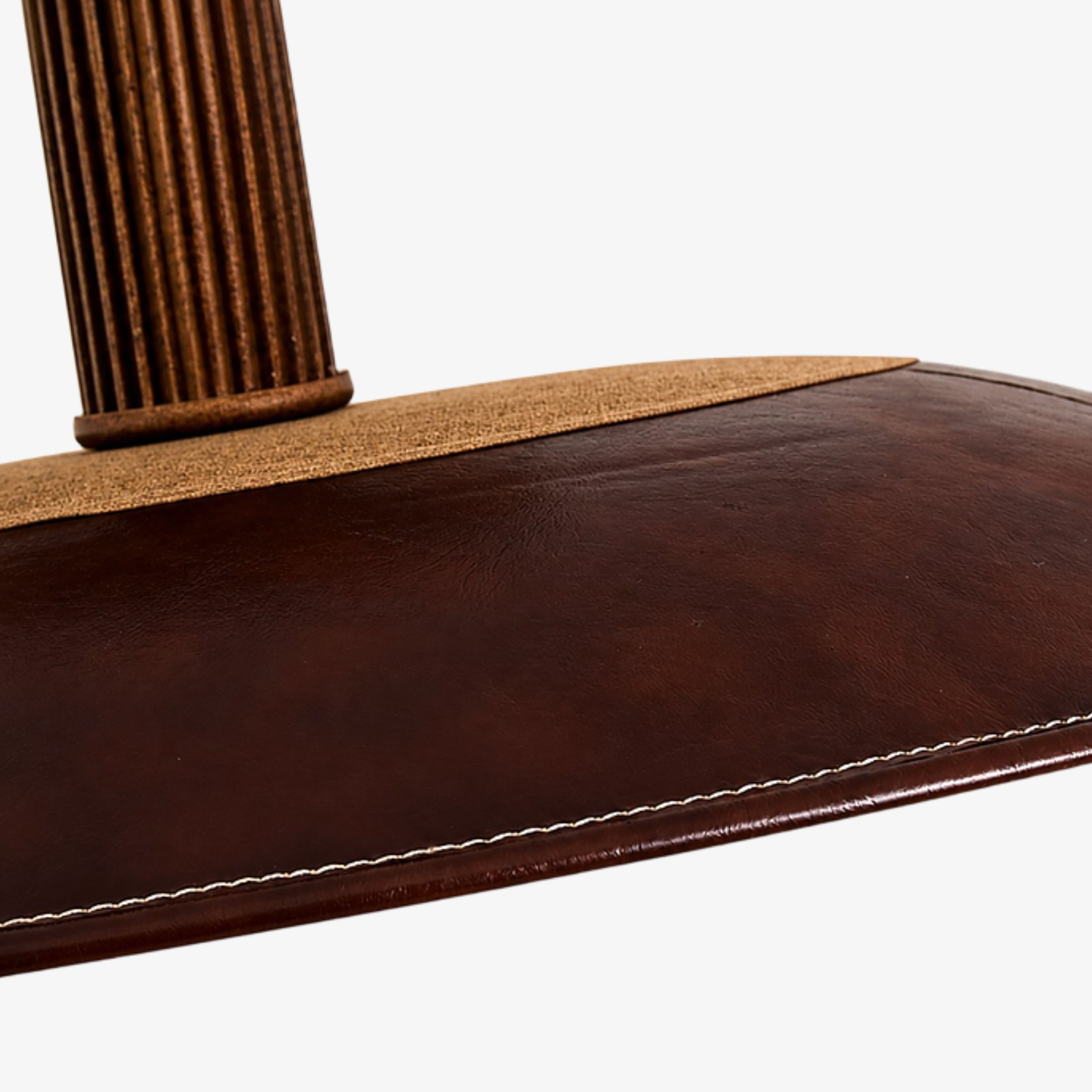 Brown stitched leather and antique brass trim detail