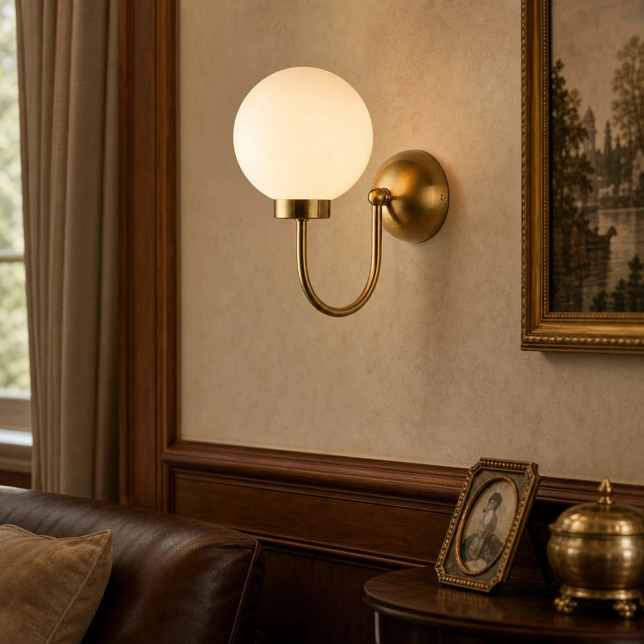 Style B Natural Brass Luma wall sconce in a vintage living room