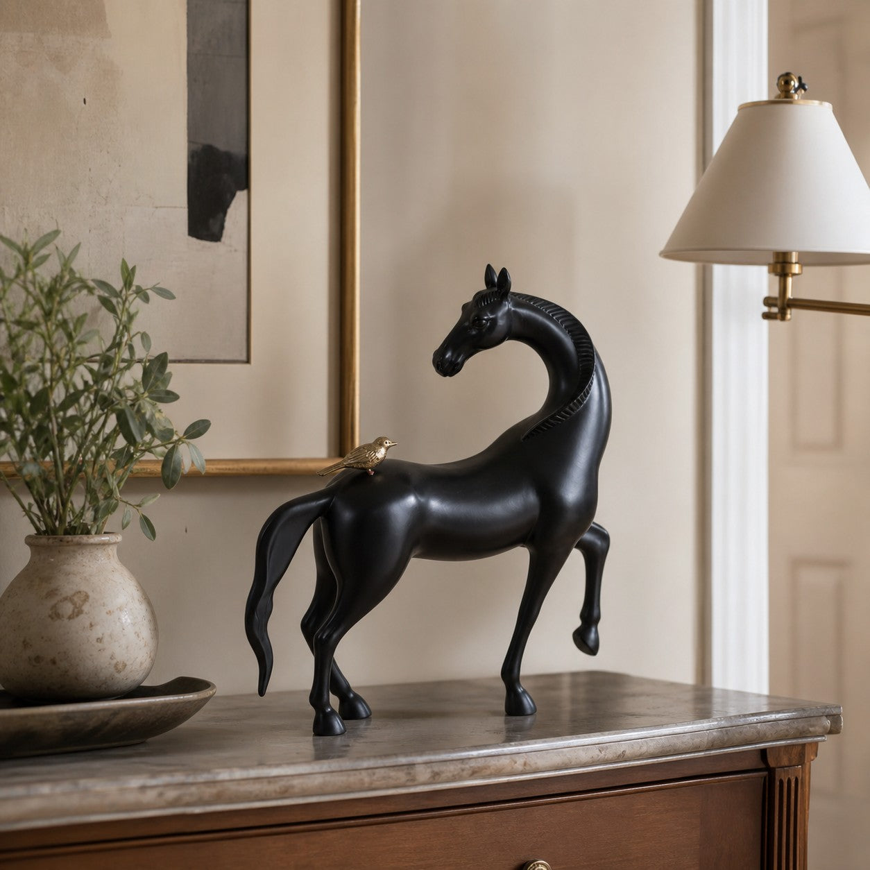 Equora black horse and copper bird sculpture detail