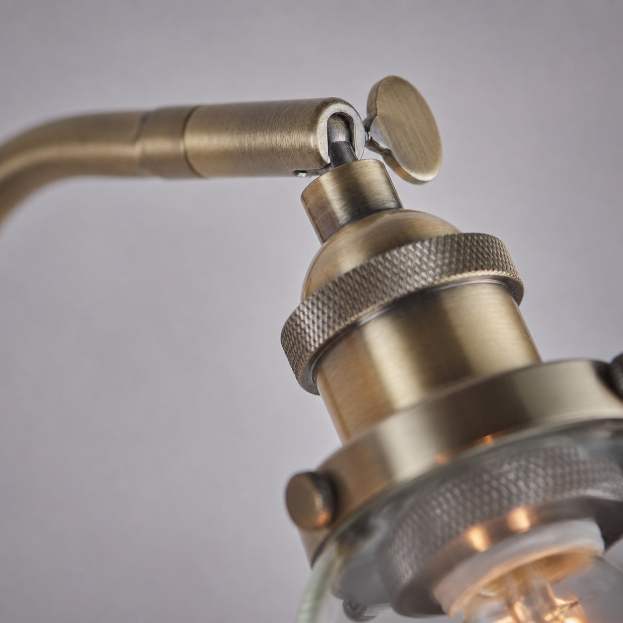 Adjustable Hansen Brass Wall Sconce - Clear Glass Design