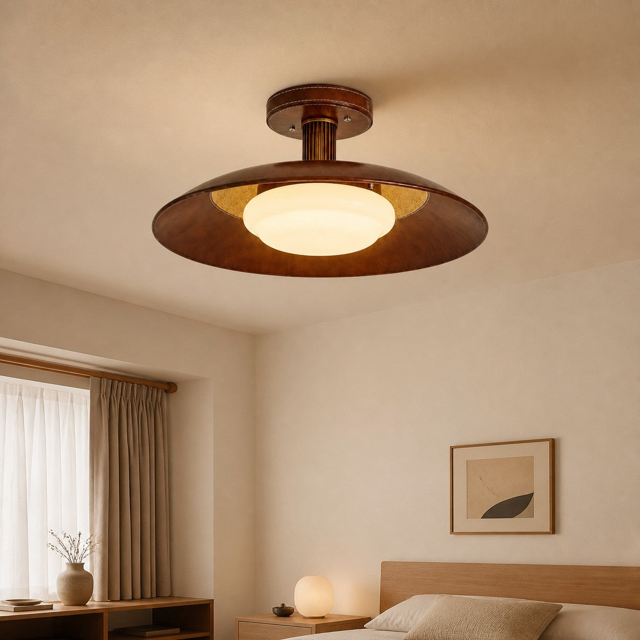 Leather disc ceiling lamp in a calm bedroom