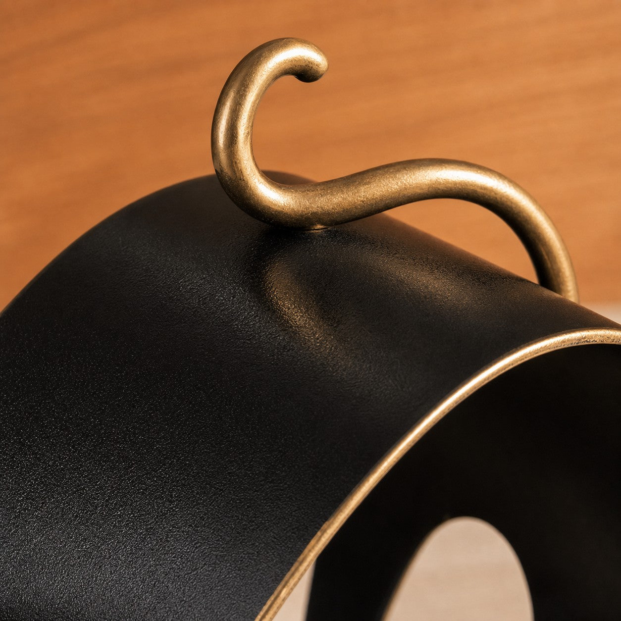Felora metal cat figurine curled tail detail