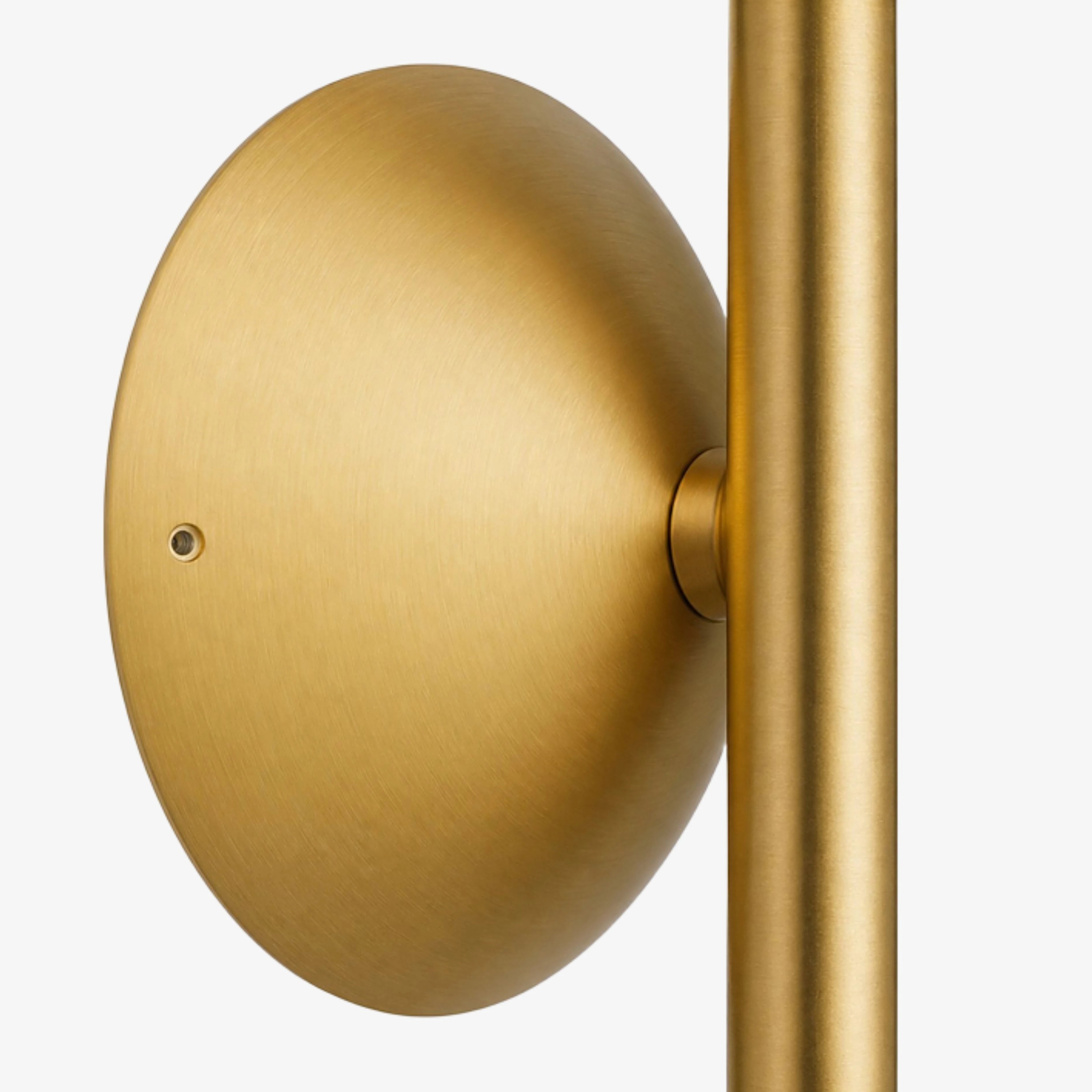 Round brushed Gold wall plate detail