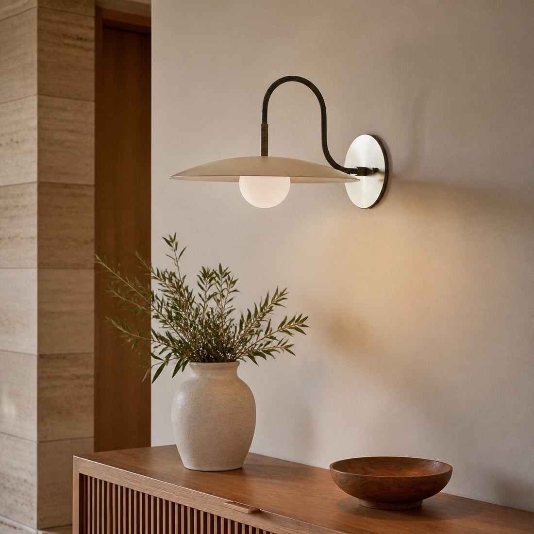 Curva Metal Modern Wall Sconce - Antique Brass Arm with Cream Disc Shade