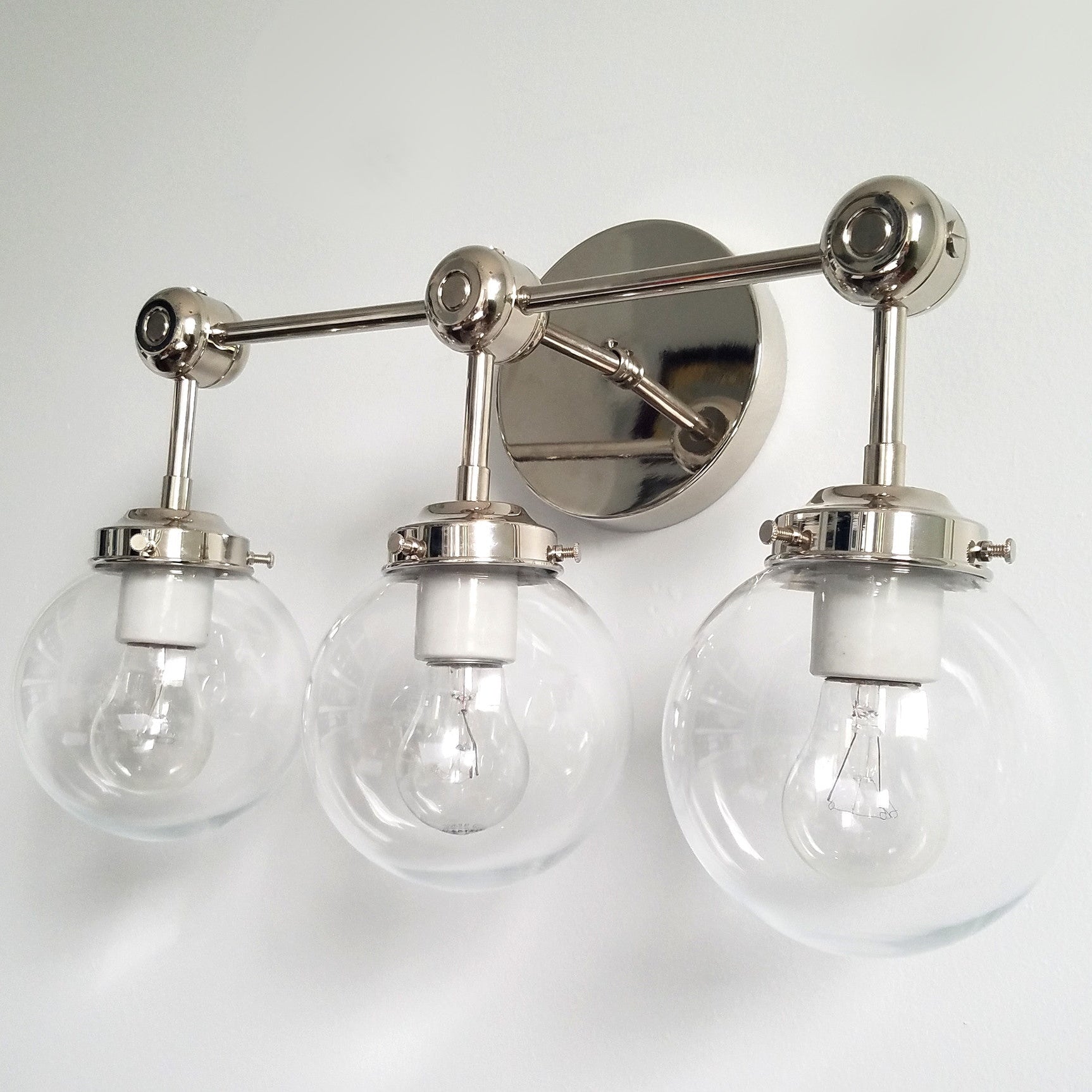 Three-Light Wall Sconce - Modern Brass & Glass Lighting for Home