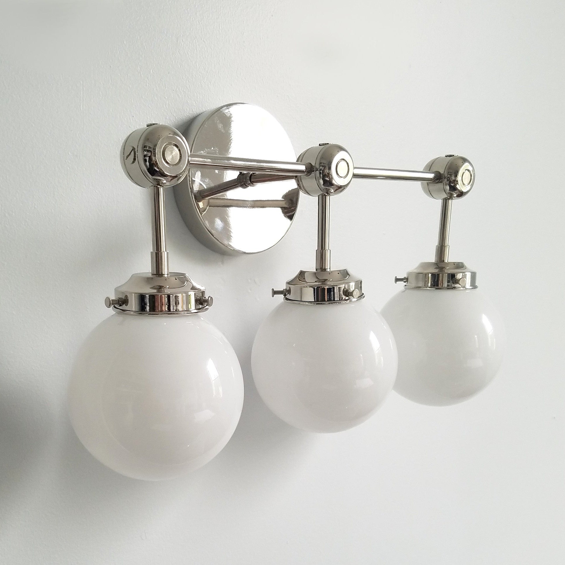 Three-Light Wall Sconce - Modern Brass & Glass Lighting for Home