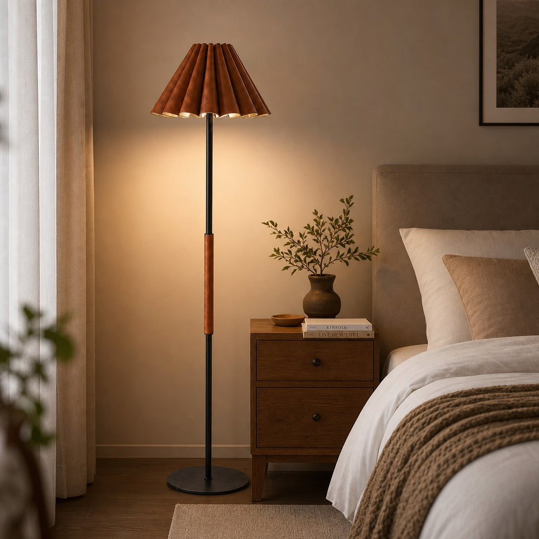 Pleated leather floor lamp illuminating a quiet corner