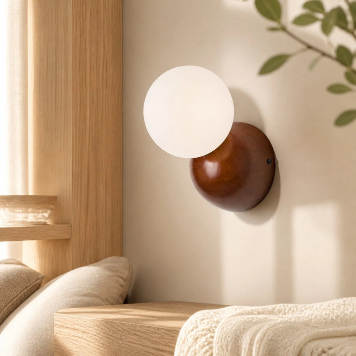 Luma walnut wall sconce in a warm bedroom