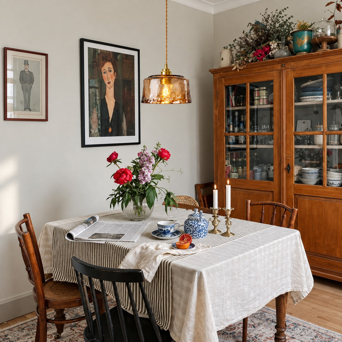Amvora amber glass pendant styled over a dining table