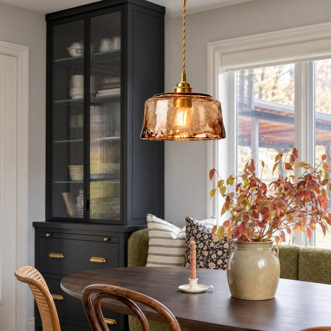 Amvora amber glass pendants styled over a kitchen island