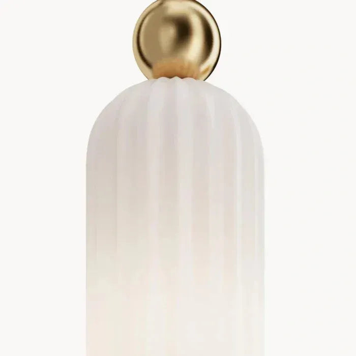 Aura ribbed milk glass wall sconce shade and cap close-up