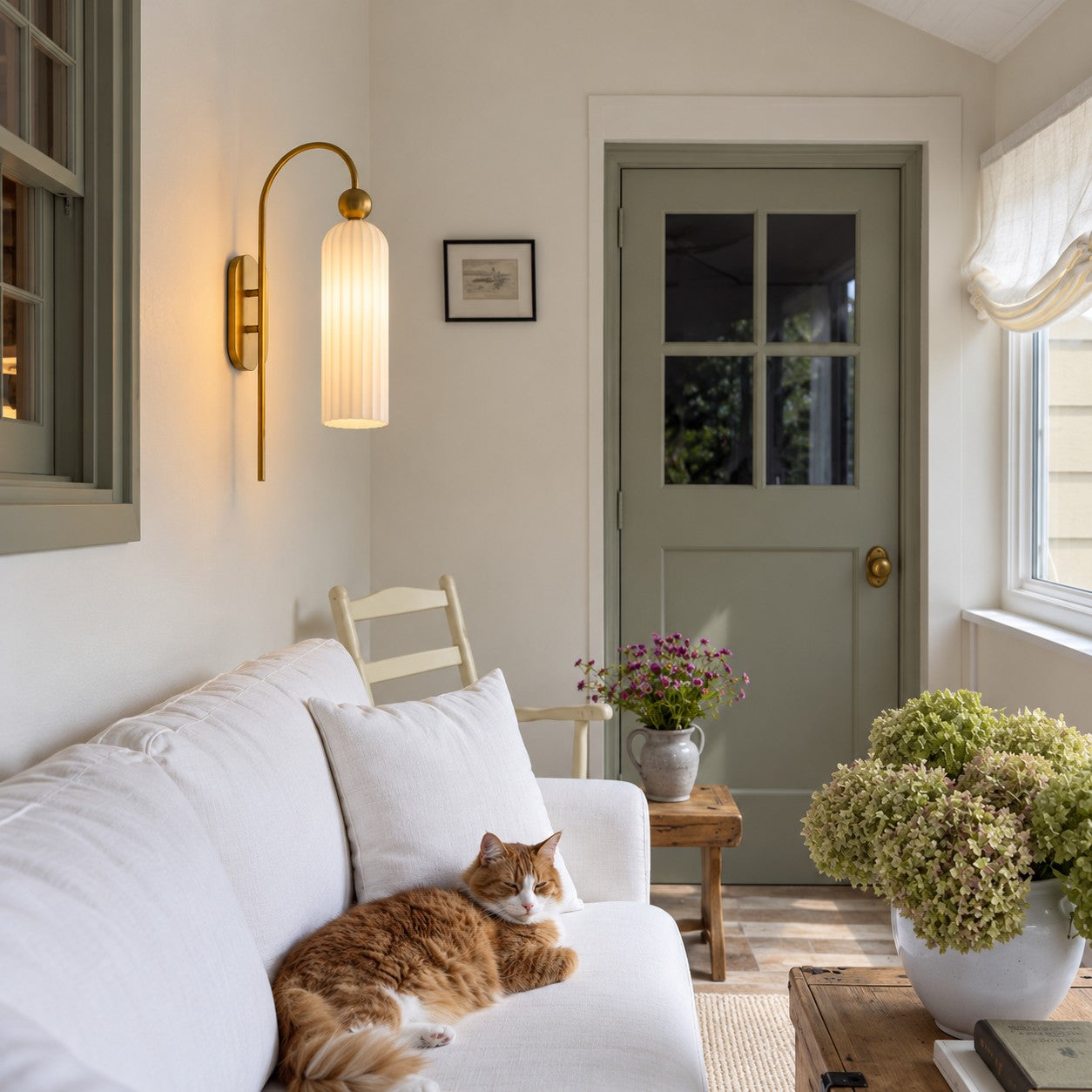 Aura milk glass wall sconce in a living room