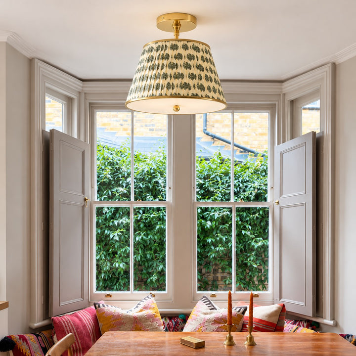 Avelora floral block print ceiling lamp styled in a bay-window dining nook