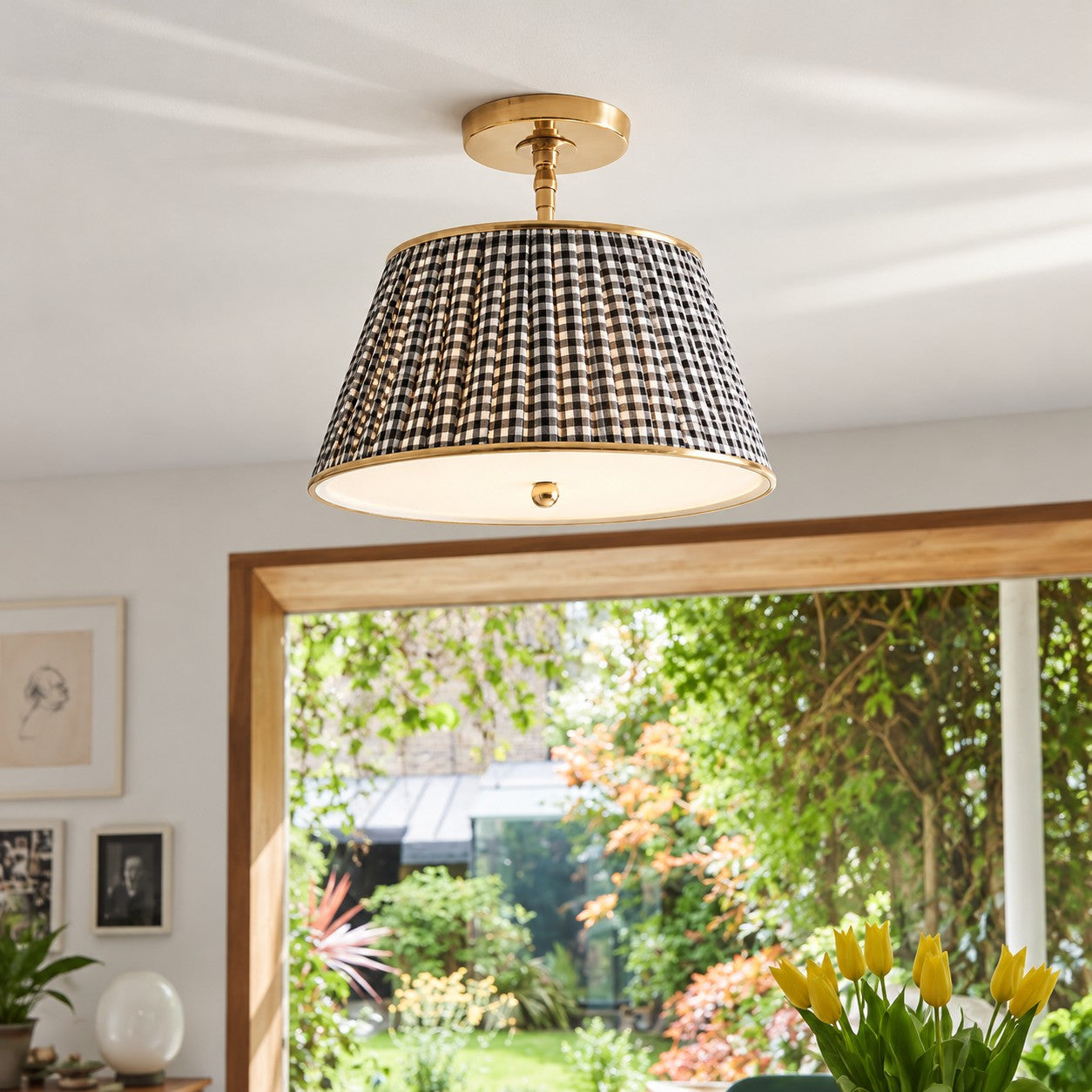 Avelora gingham pleated ceiling lamp styled by a garden window
