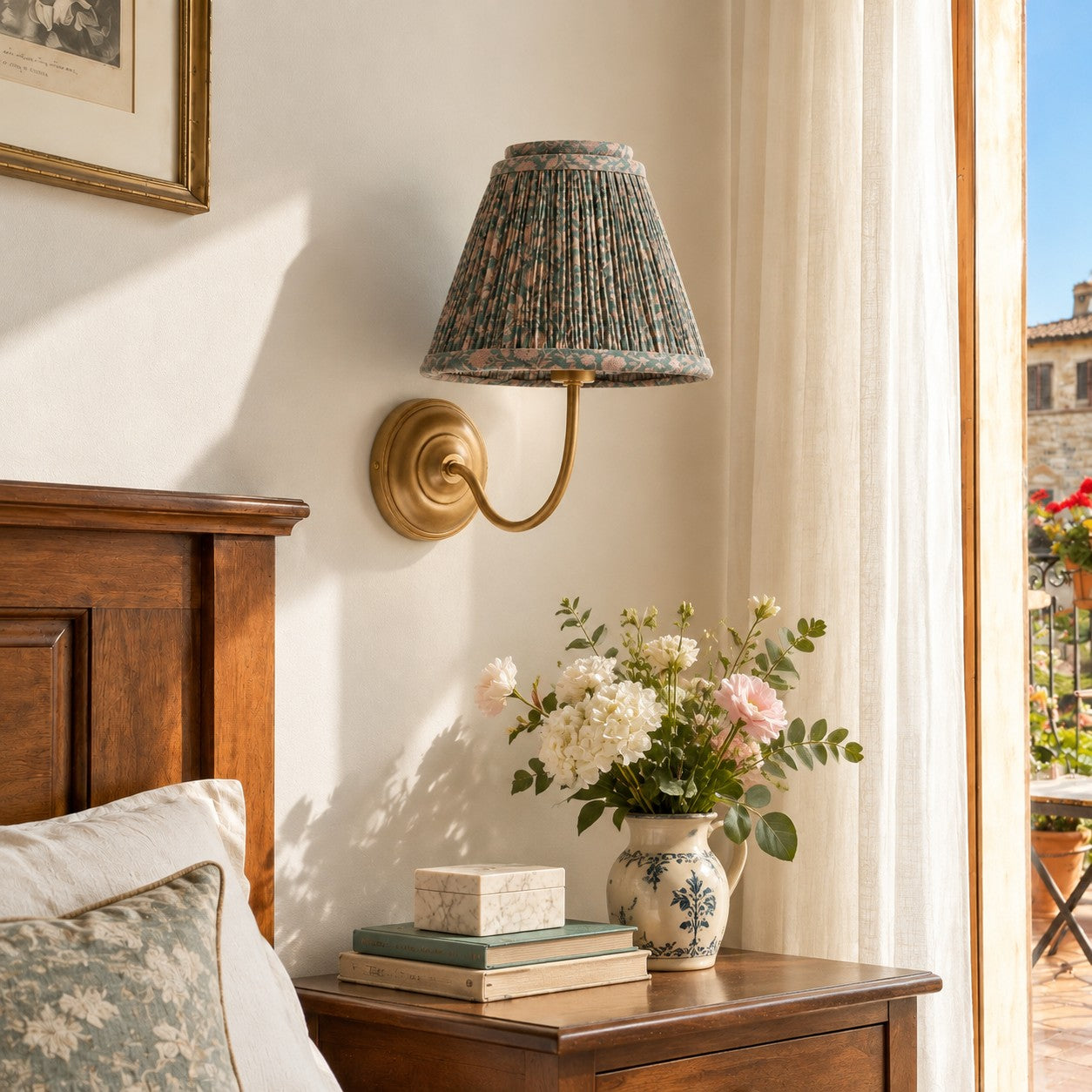 Avelora wall sconce styled above a bedroom nightstand
