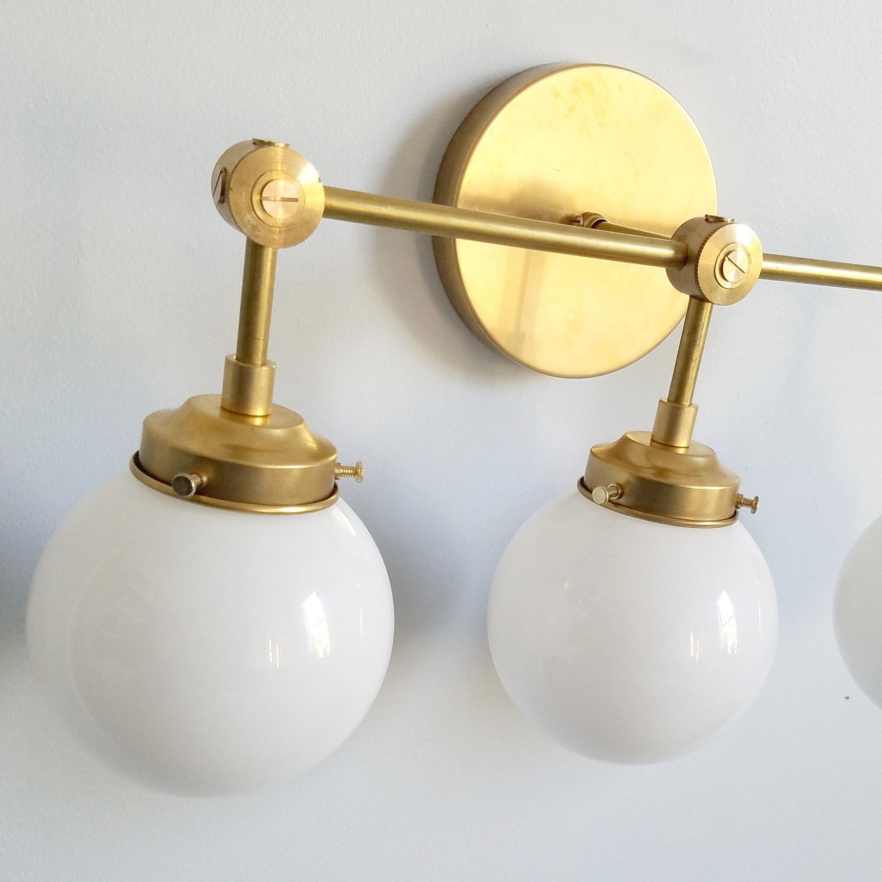 Three-Light Wall Sconce - Modern Brass & Glass Lighting for Home