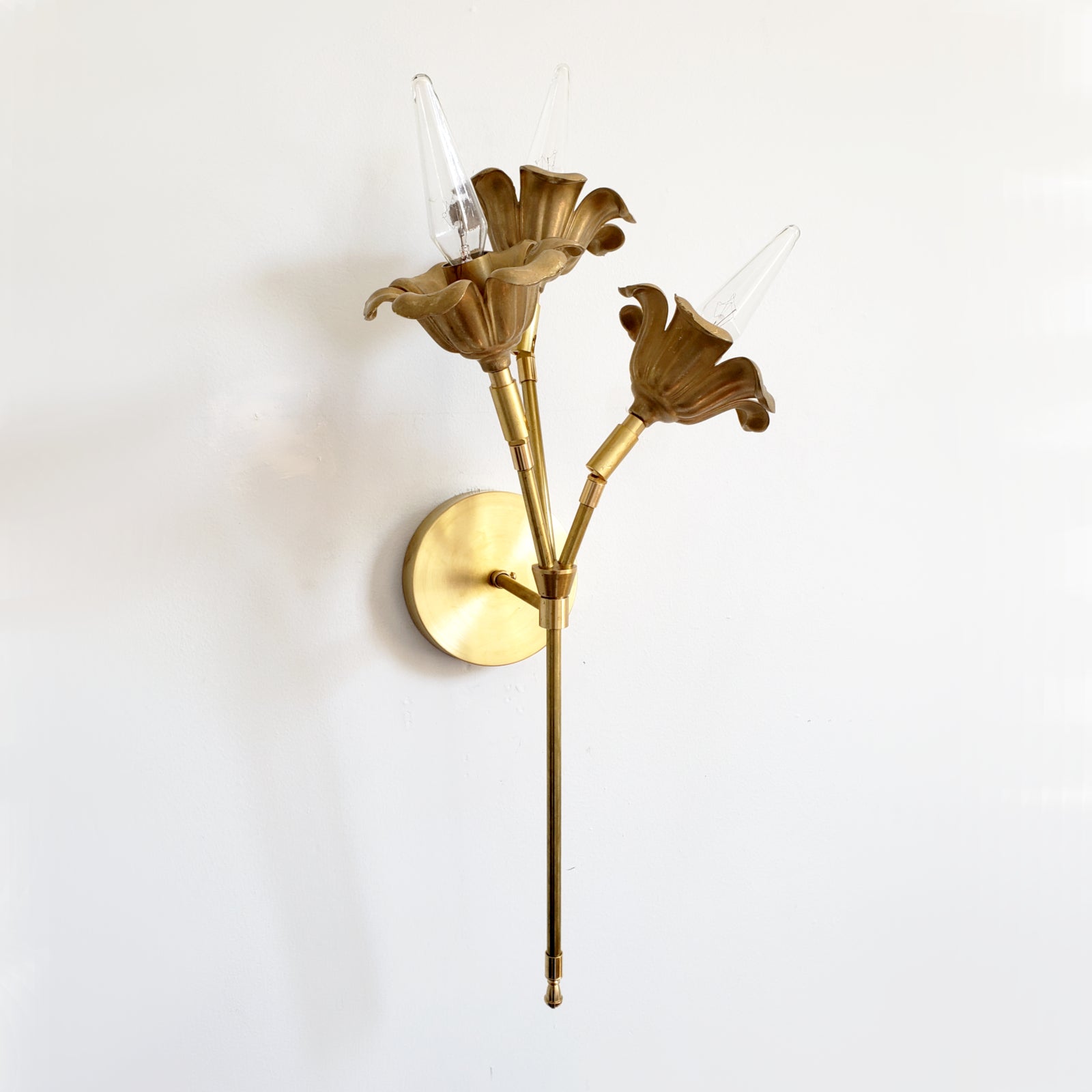 Three-Light Brass Wall Sconce - Floral Design for Elegant Interiors