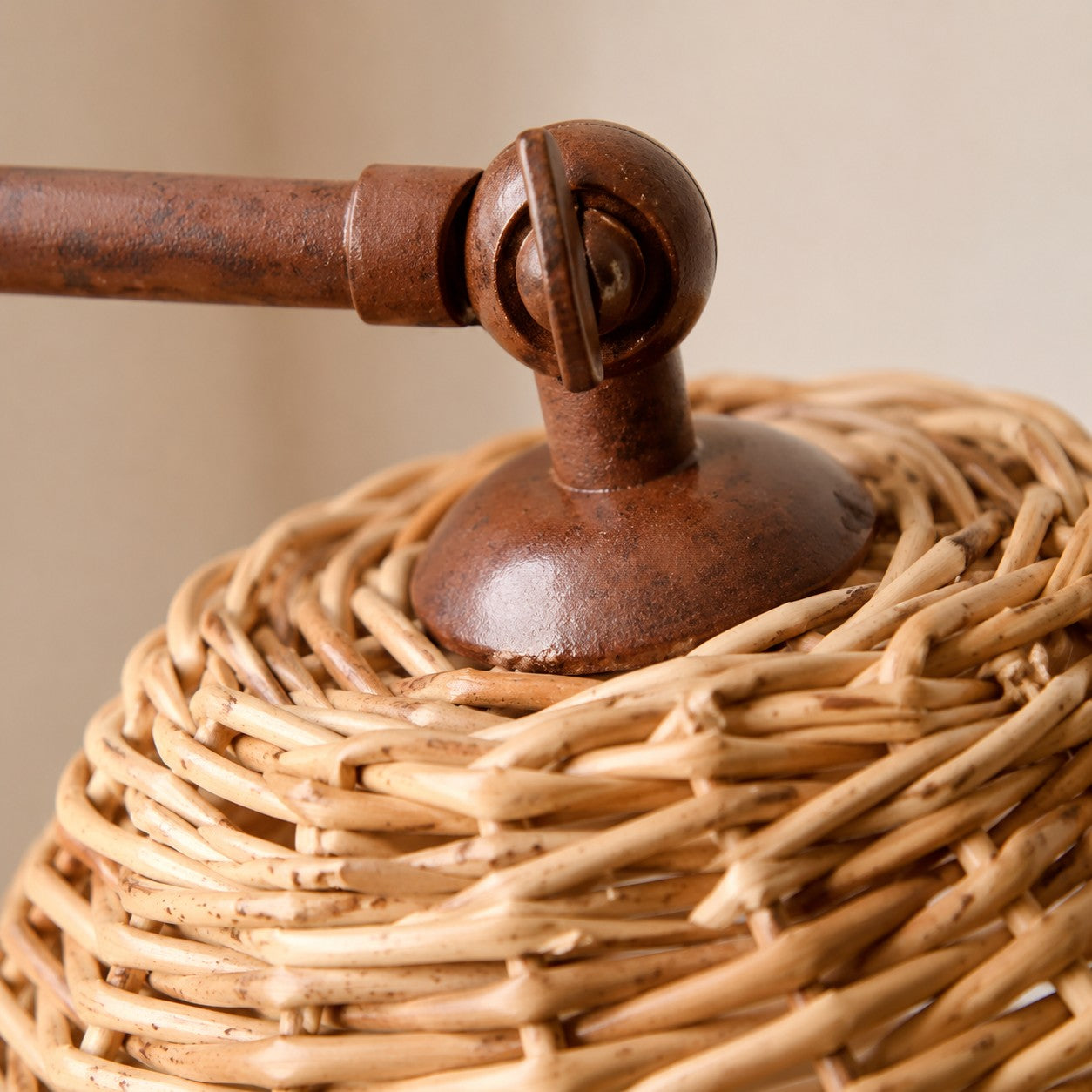 Handwoven Rattan Shade Table Lamp with Curved Metal Frame
