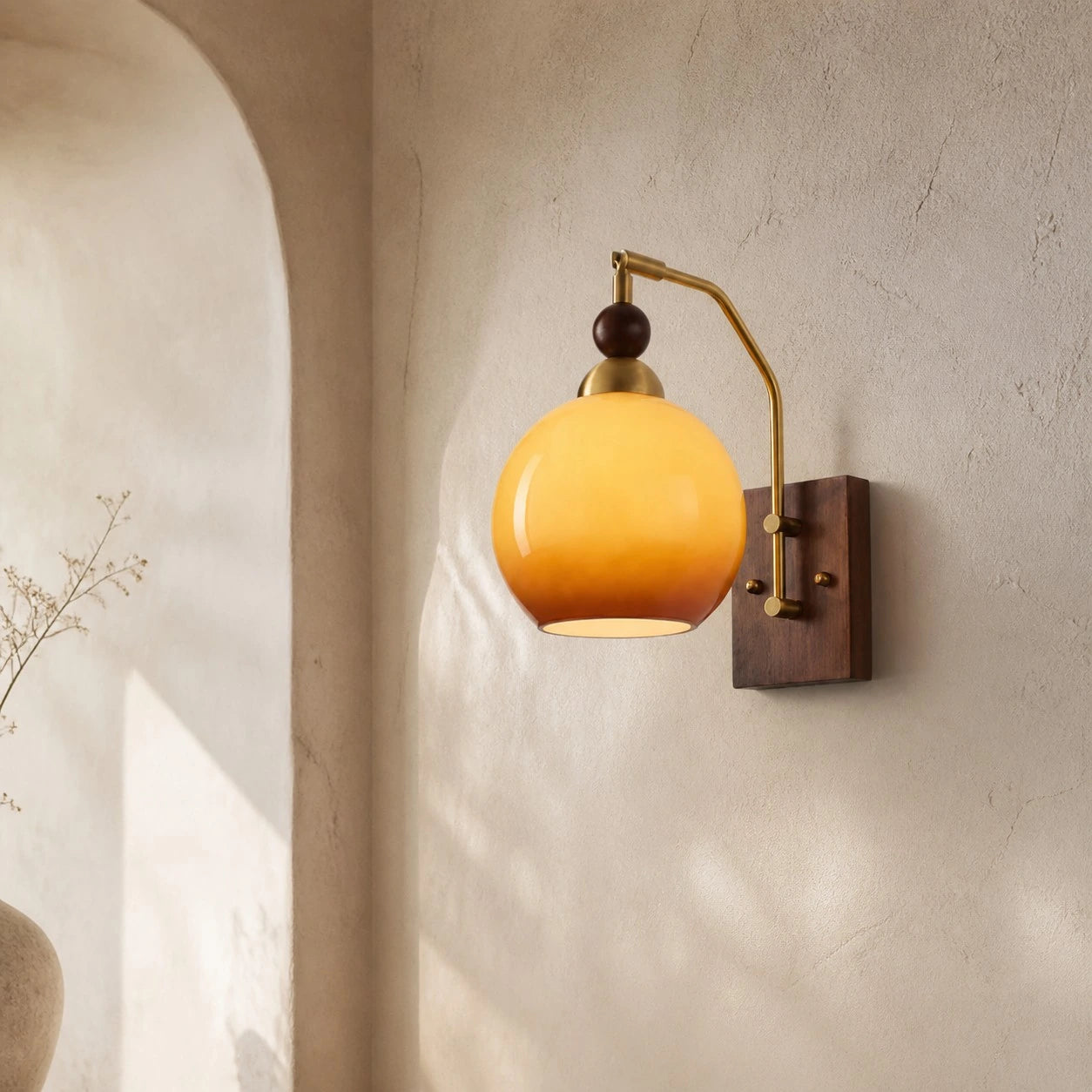 Luma gradient wall sconce in an arched neutral interior