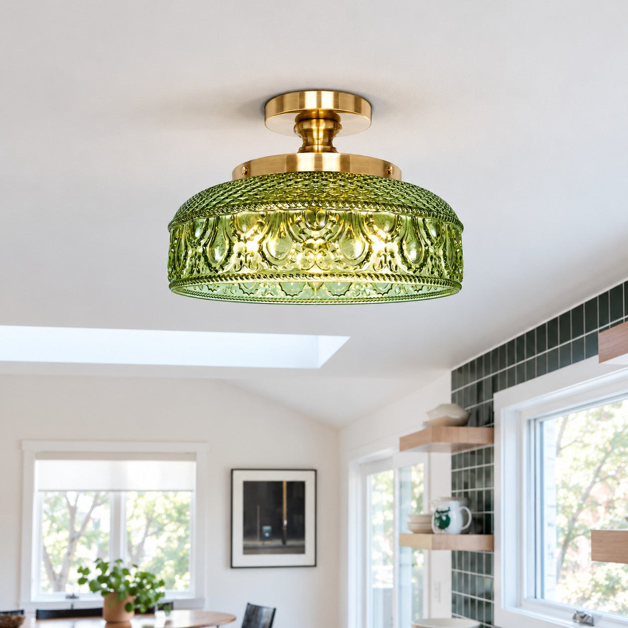 Blossix green glass ceiling light over a kitchen island