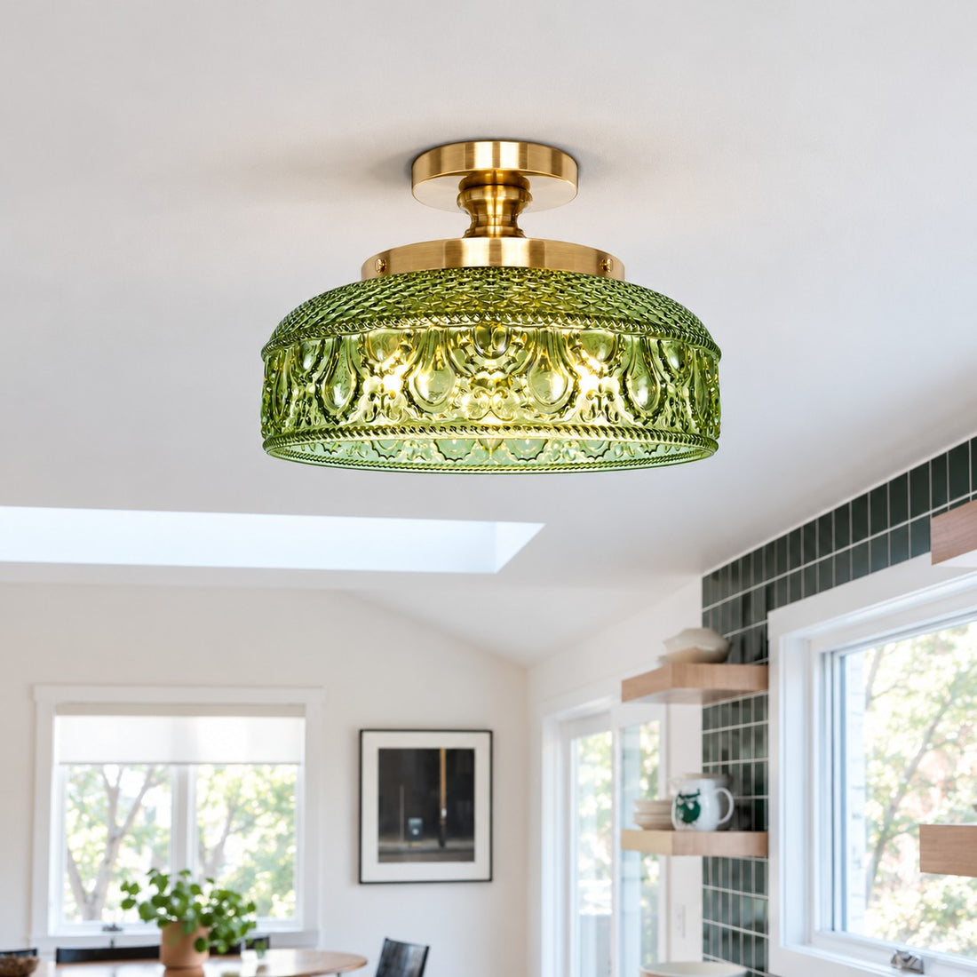 Blossix green glass ceiling light over a kitchen island