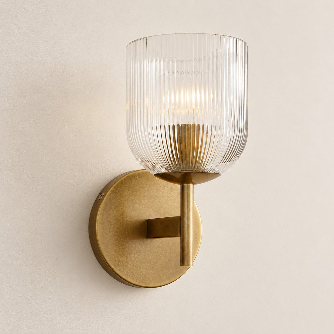 Bravira ribbed glass sconce, tumbled brass, 1 head