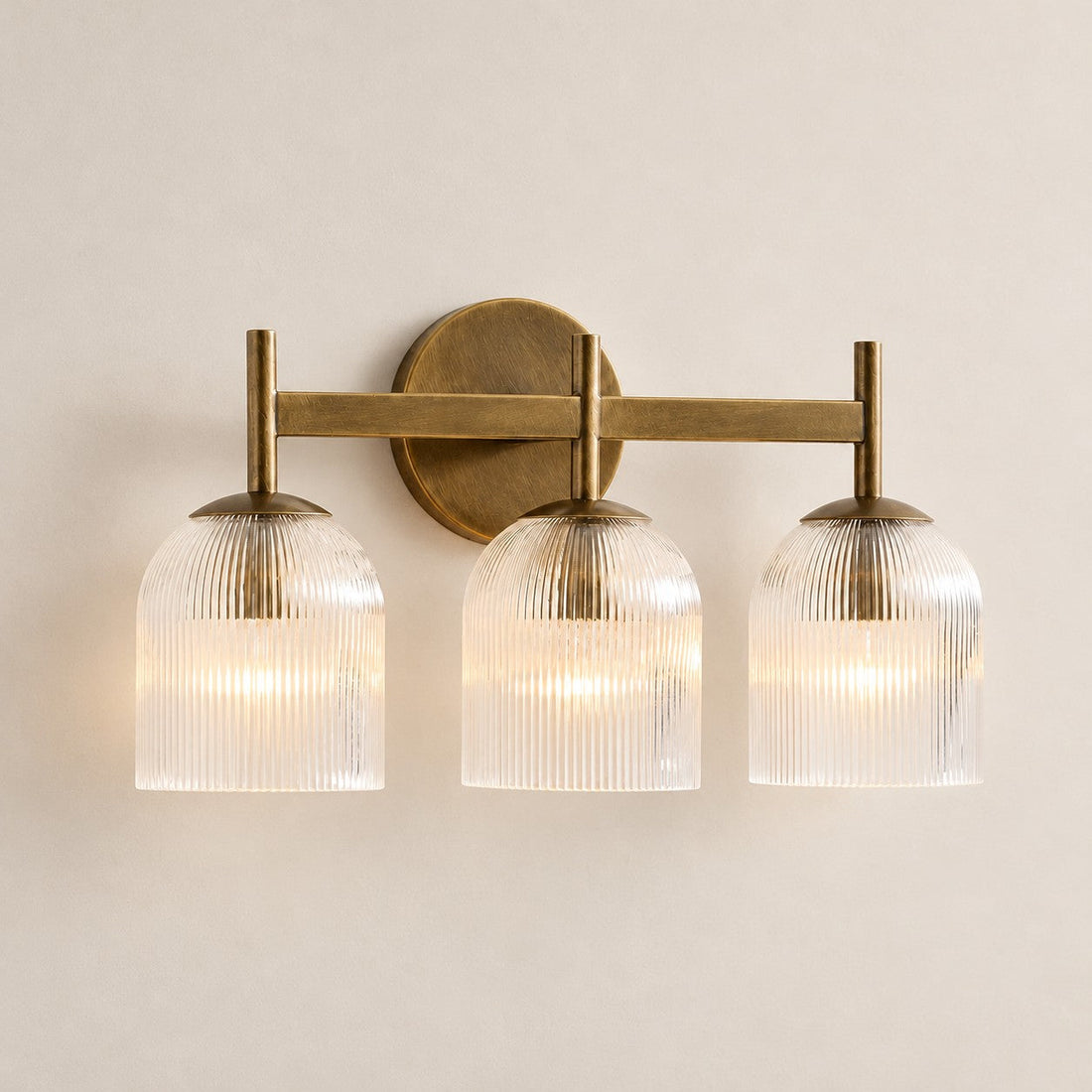 Bravira ribbed glass sconce, tumbled brass, 3 heads