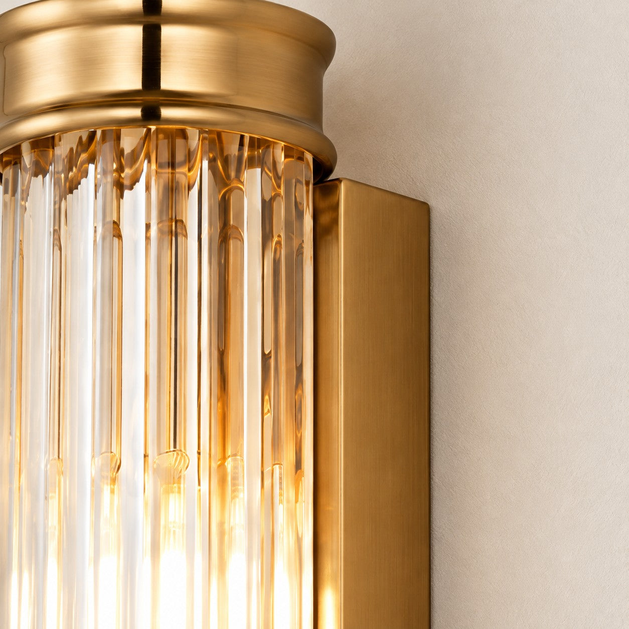 Close-up of the ribbed glass cylinder and filament bulbs
