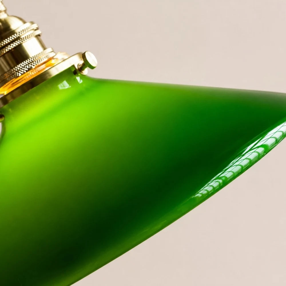 Cone green glass pendant lamp rim and brass hardware detail