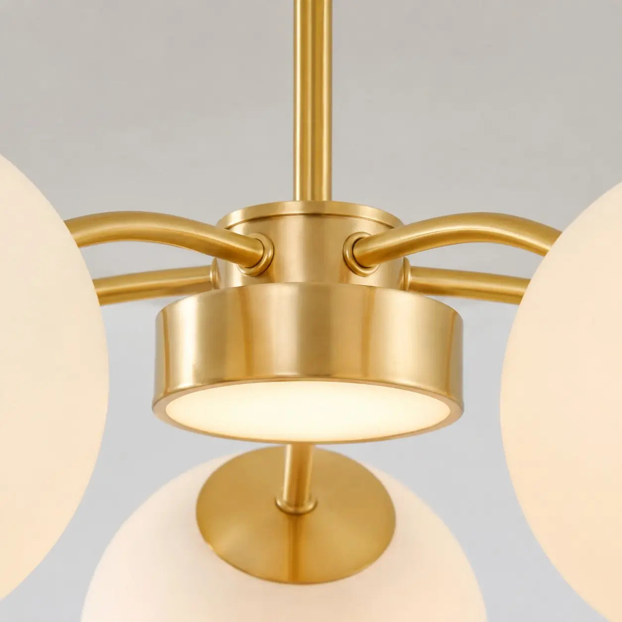 Gold metal chandelier central body detail