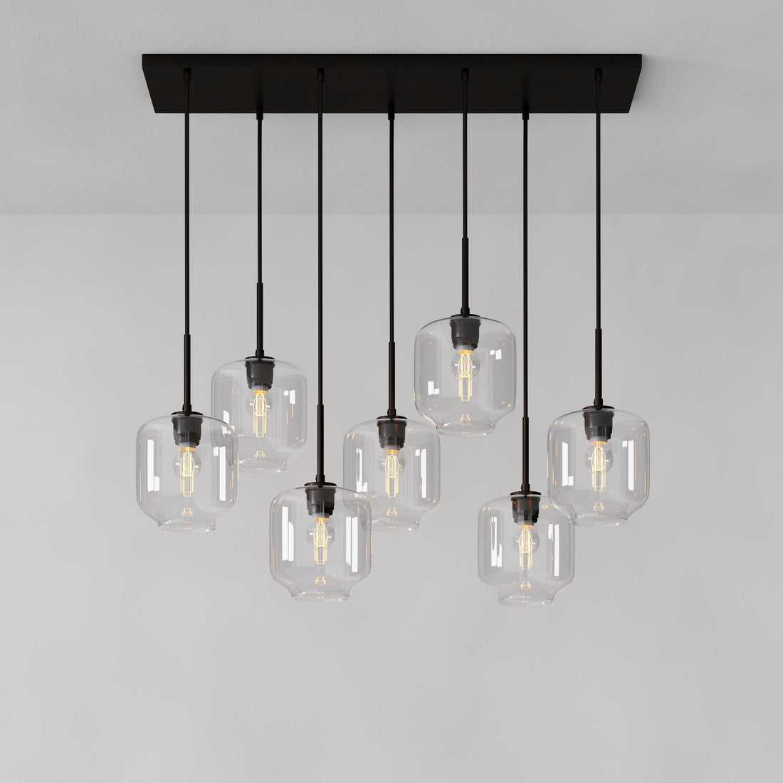 Lumivelle Sculptural 7-Light Chandelier – Adjustable Height Modern Glass Pendant