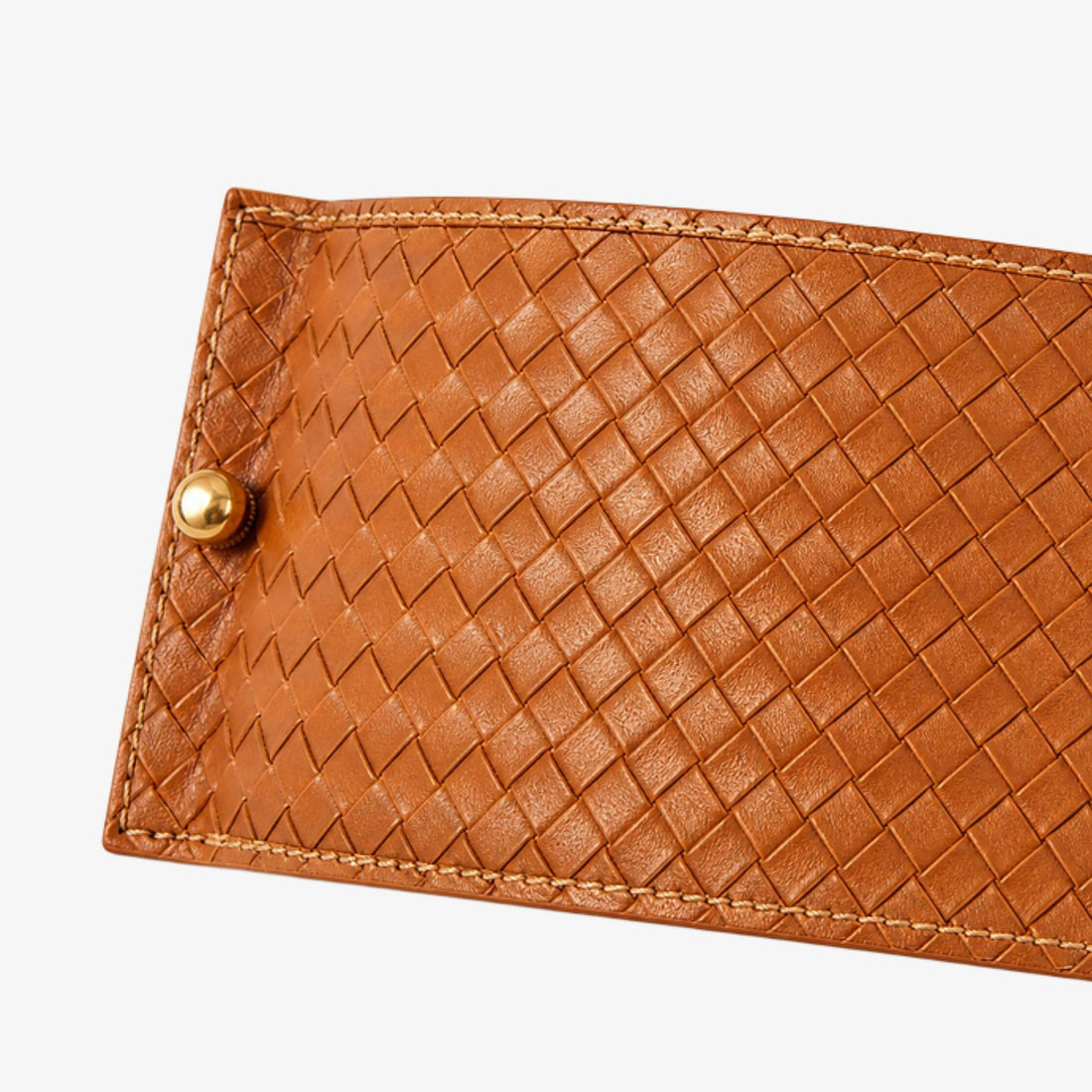 Cognac woven leather, stitching, and brass fastener