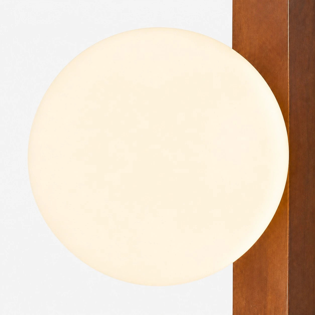 Opal globe and vertical Walnut rail detail
